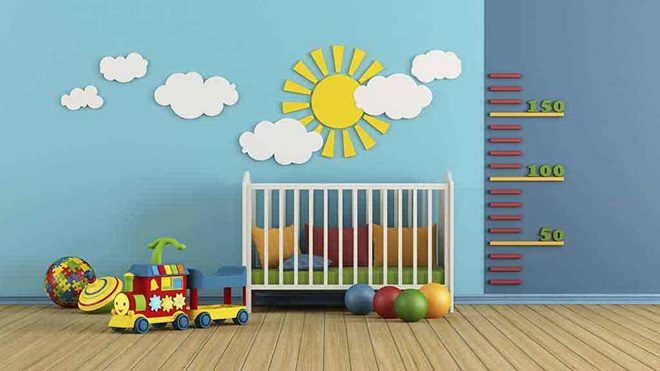 cot and toys in bedroom